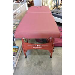 MAROON MASSAGE TABLE IN CARRY CASE