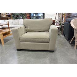 PHOENIX INTERNATIONAL OVERSIZED TAN ARM CHAIR