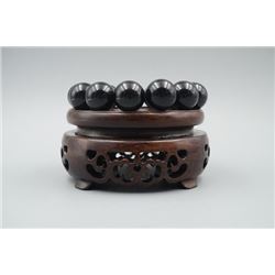 An Obsidian Bead Bracelet with 18mm Beads.