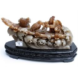 Large jadeite carving of fisherman on bamboo raft, signed with characters underneath, 14x8" 