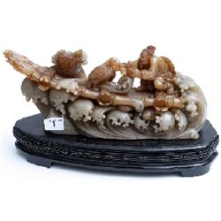 Large jadeite carving of fisherman on bamboo raft, signed with characters underneath, 14x8  