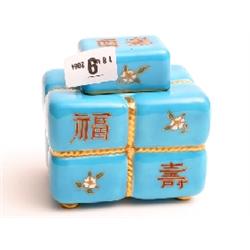 Small porcelain oriental lidded jar with character and flower decoration, possibly some restoration