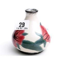 Cobridge stoneware pot decorated with flowers, signed Emma?