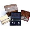 Image 1 : 3 boxes of medical instruments, syringes, pen light with mirror, and cased ear light