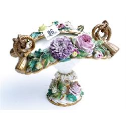 Late 19c continental porcelain centre piece with raised floral decoration possibly German