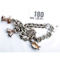 Silver hallmarked chain link charm bracelet with 6 charms