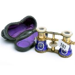 Cased set of ladies racing glasses, decorated with blue and silver enamel, inscribed 'Maison De Chev