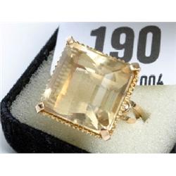 Large square cut stone ring with gilt setting