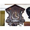 Image 1 : Large old cuckoo wall clock with Swiss cottage shaped housing in working order