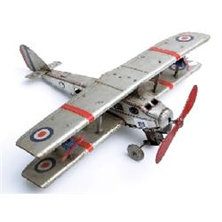 Tin plate Mettoy mechanical biplane, playworn, in original condition, wheels marked Dunlop, wing spa