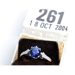 9ct gold and platinum ring set with sapphire solitaire