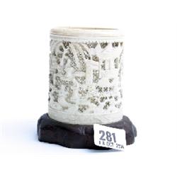 Finely carved oriental scene ivory tusk 3.5" high, mounted on wooden base