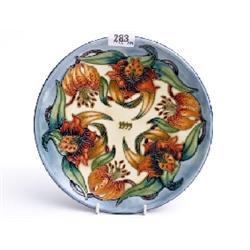 Moorcroft Tiger Lily limited edition plate 59/750, inscribed on reverse WM98, 9" diameter