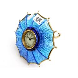 German brass and blue glass umbrella mantle clock with porcelain face marked FMS