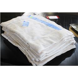 ONE DOZEN OF BEIGE BATH MATS