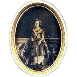 Daguerreotype, French Girl with Hoop and StickShe leans on an unusual sculptural balustrade. There's