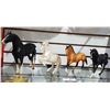 Image 1 : 4 COLLECTIBLE BREYER HORSES