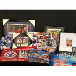 COLLECTION OF AUTOGRAPHED CONOR MCDAVID MEMORABILIA INC. MAGAZINES, FIGURINES, PUCK AND MORE, ALSO