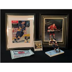 COLLECTION OF AUTOGRAPHED HULL FAMILY HOCKEY MEMORABILIA INC. PIECES SIGNED BY BOBBY HULL, BRETT