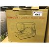 Image 1 : SINGER QUANTUM STYLIS 9960 PROGRAMMABLE SEWING MACHINE COMES WITH A DRESS FORM MANNEQUIN