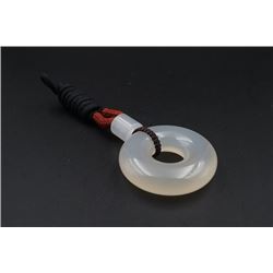 A Lage Deep Sea Agate "Peace Buckle" Pendant with String Necklace.