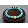 Image 2 : A Turquoise and Amber Round Beads Bracelet.