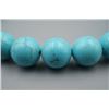Image 3 : A Turquoise and Amber Round Beads Bracelet.