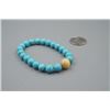 Image 4 : A Turquoise and Amber Round Beads Bracelet.