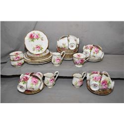 Large selection of Royal Albert American Beauty china including 23 saucers, 17 tea cups, three cream