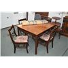 Image 1 : Mid 20th century walnut dining table and single fold over leaf and four insert leafs plus four dinin