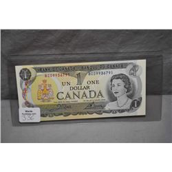 Ten non-circulated 1973 Canadian one dollar bills with sequential serial numbers