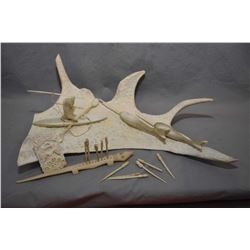 Selection of hand carved collectibles including antler diorama with spear hunter and narwhals, an el