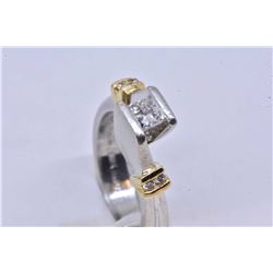 Lady's 18kt yellow gold and platinum diamond engagement ring set with .41ct princess cut center ston