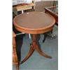 Image 1 : Leather top mahogany single pedestal occasional table with brass capped feet, 24" in diameter