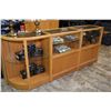 Image 1 : Oak and glass U-shaped retail display and cash center with adjustable glass shelving, and storage ar