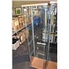 Image 1 : Free standing column style display cabinet with single door and three glass shelves, 64" in height