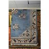 Image 1 : Blue and floral Oriental motif area carpet 96" X 124"