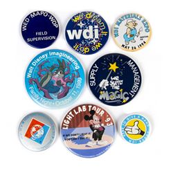 Collection of (8) Imagineering Buttons.