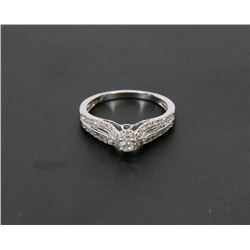 40) 14K WHITE GOLD AND DIAMOND RING