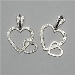 45) STERLING SILVER 2 HEARTS PENDANT
