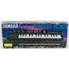 Image 1 : YAMAHA PORTA SOUND PSS-100 KEYBOARD WITH ADAPTOR.