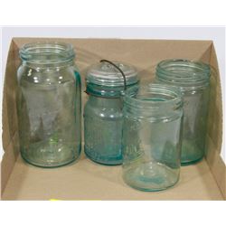 FOUR AQUA BLUE MASON JARS.