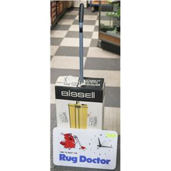 RUG DOCTOR CLOCK AND VINTAGE BISSEL RUG SHAMPOO