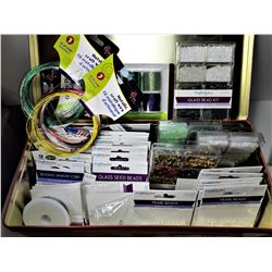 21) LARGE XMAS TIN FILLED WITH JEWELRY