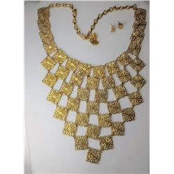 19)  GOLD TONE FILAGREE STATEMENT