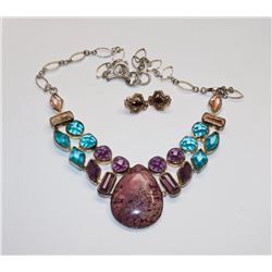 12)  VINTAGE LARGE PEAR SHAPED PURPLE