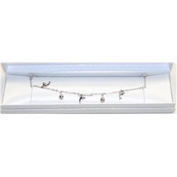 STERLING SILVER DOLPHIN THEMED BRACELET.