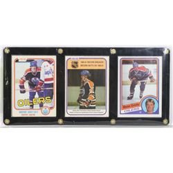 3 FRAMED 1980S WAYNE GRETZKY CARDS.