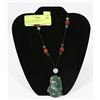 Image 1 : CARVED JADE PENDANT ON STONE BEADED NECKLACE