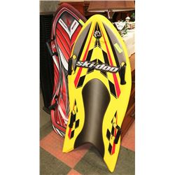 2 SLEDS (SKIDOO & SNO-STORM).